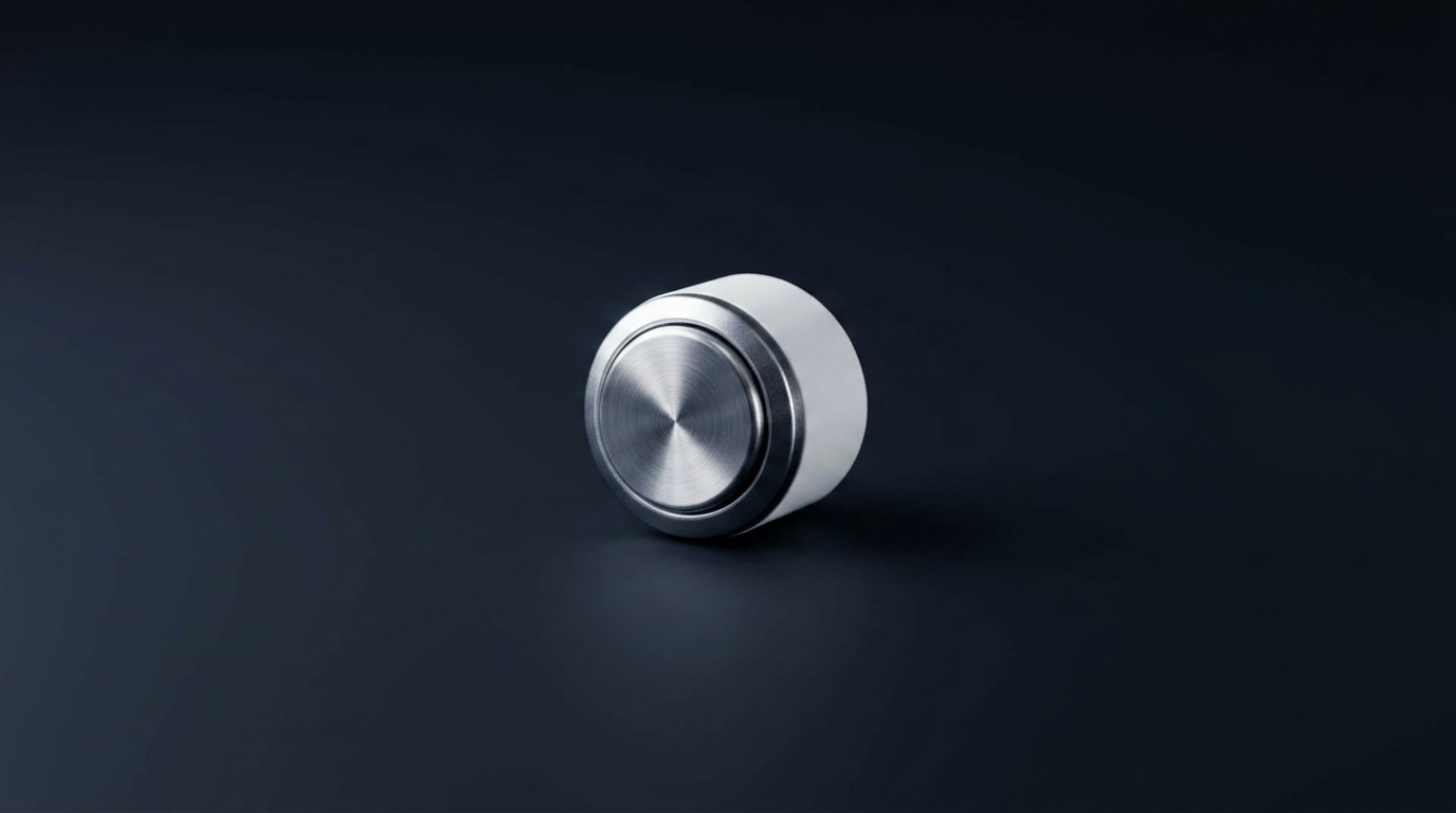 A single brushed aluminium toggle button on a calm dark surface, representing user control and consent